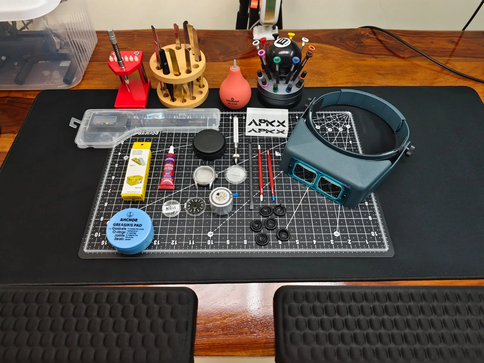 Eye-level view of a watchmaker assembling a mechanical watch movement