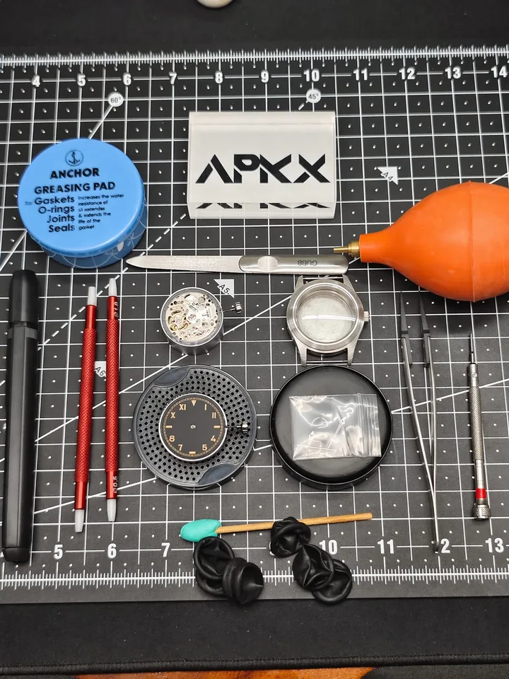 Tools and parts on the APKX workbench